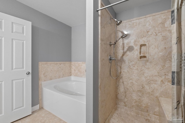 full bathroom featuring tile patterned flooring, a garden tub, and a shower with shower curtain