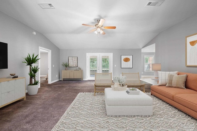 living area featuring carpet flooring, vaulted ceiling, and visible vents
