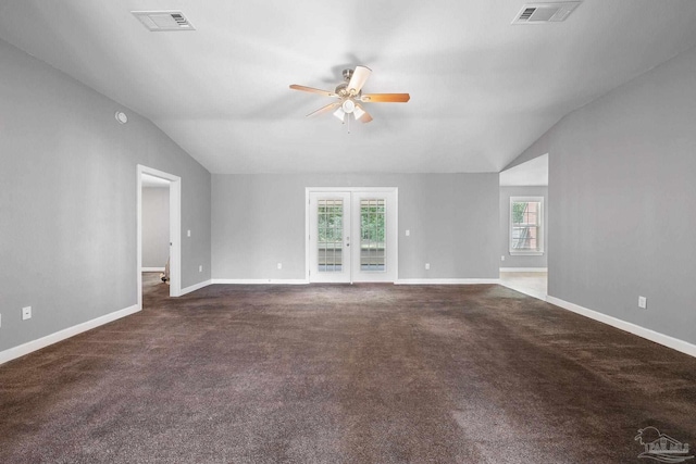 spare room with ceiling fan, visible vents, plenty of natural light, and lofted ceiling