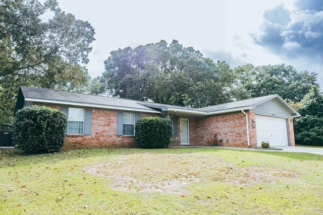 4408 Chantilly Way, Milton, FL 32583 - single story home with brick siding, an attached garage, a front lawn, and concrete driveway