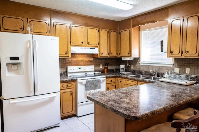 kitchen featuring white appliances, sink, decorative backsplash, a textured ceiling, and light tile patterned flooring