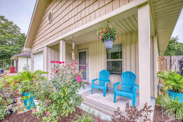 3963 Edgefield St, Pace, FL 32571 - property entrance with covered porch, board and batten siding, and a garage