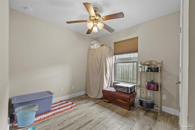 3963 Edgefield St, Pace, FL 32571 - bedroom featuring wood finished floors, baseboards, and ceiling fan