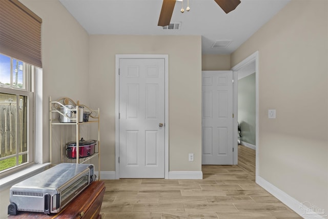 3963 Edgefield St, Pace, FL 32571 - bedroom with light wood-type flooring, baseboards, and ceiling fan