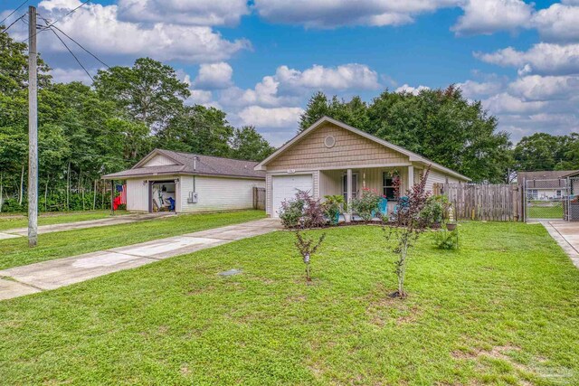 3963 Edgefield St, Pace, FL 32571 - view of front of property featuring concrete driveway, a porch, and a gate
