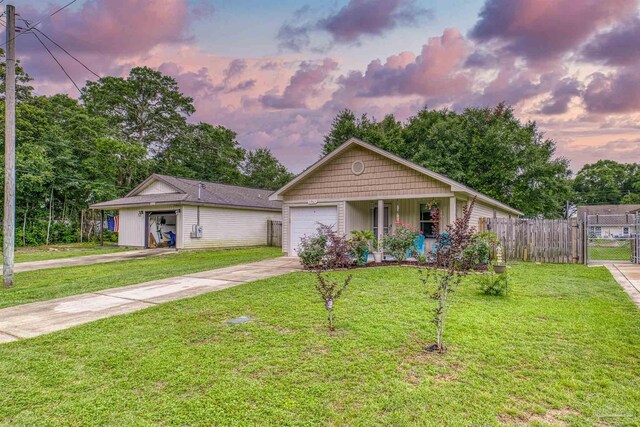 3963 Edgefield St, Pace, FL 32571 - view of front facade featuring concrete driveway, a porch, and a gate