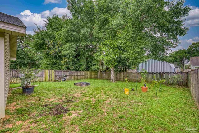 3963 Edgefield St, Pace, FL 32571 - view of yard with a fire pit