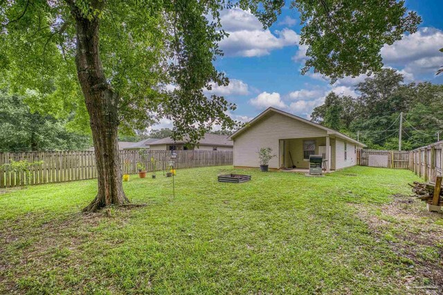 3963 Edgefield St, Pace, FL 32571 - view of yard featuring a fire pit