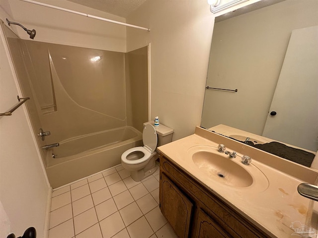 full bathroom featuring vanity, tile patterned floors, shower / washtub combination, toilet, and a textured ceiling