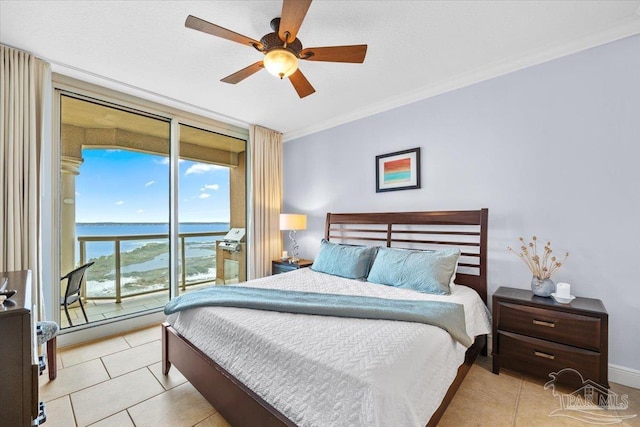 bedroom featuring a water view, ceiling fan, crown molding, and light tile patterned flooring