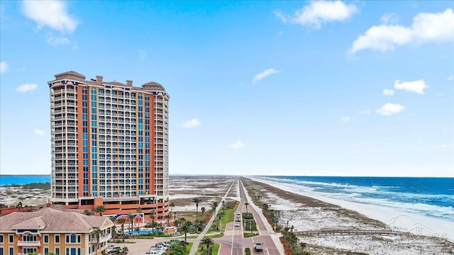 property view of water featuring a beach view