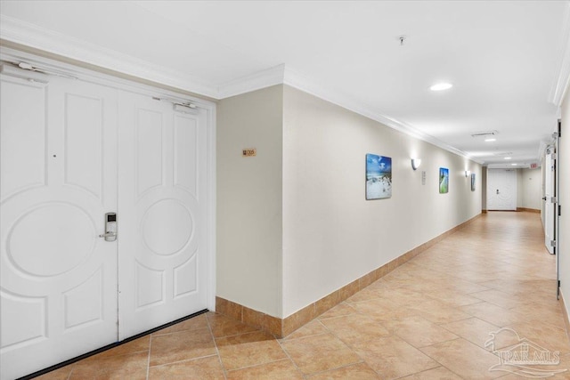 corridor featuring crown molding