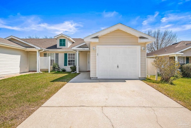 view of front of home featuring a garage, concrete driveway, a front lawn, and a shingled roof