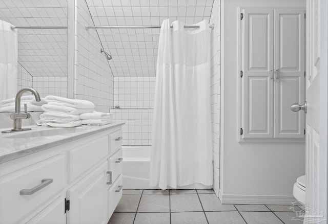 full bathroom with shower / bath combo, vanity, toilet, and tile patterned floors
