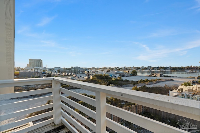 balcony featuring a water view