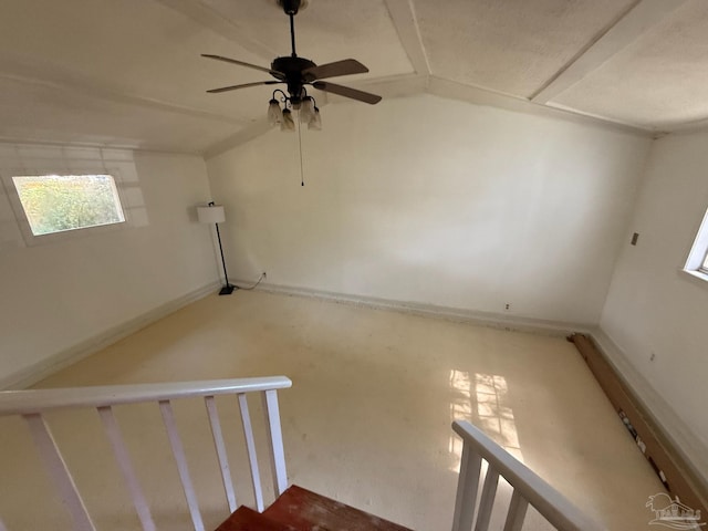 additional living space featuring vaulted ceiling