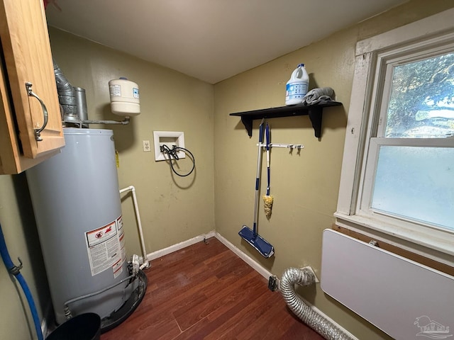 utility room with gas water heater