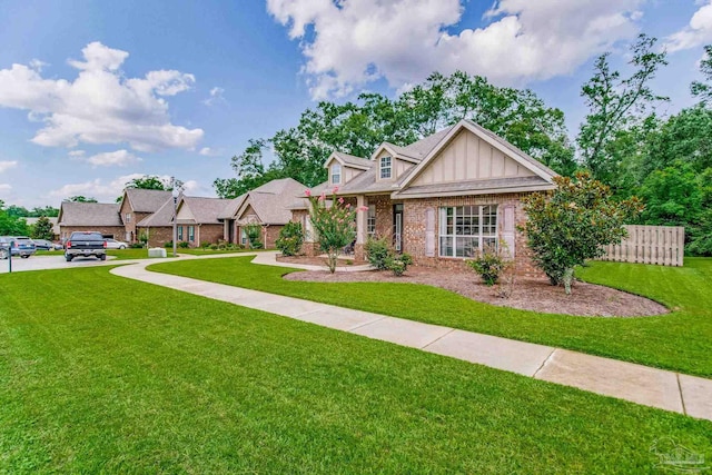 craftsman inspired home with a front yard