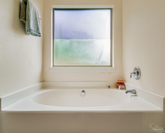 bathroom with a bath