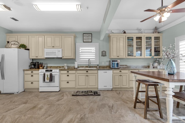 kitchen with ceiling fan, white appliances, ornamental molding, cream cabinets, and sink