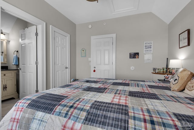 bedroom with lofted ceiling and carpet flooring