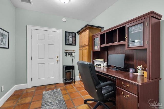 office space with tile patterned floors