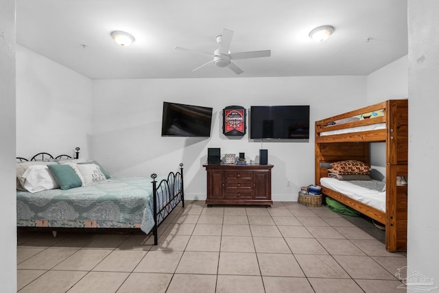 bedroom featuring ceiling fan and light tile patterned floors