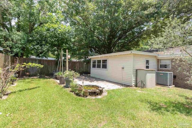 7026 Balboa Dr, Pensacola, FL 32526 - fenced backyard featuring a fire pit and a patio area