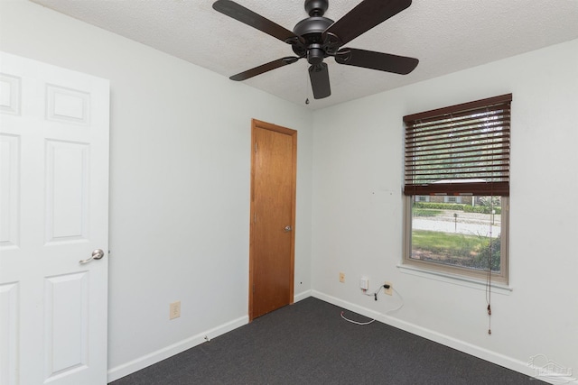 7026 Balboa Dr, Pensacola, FL 32526 - unfurnished bedroom with a textured ceiling, carpet flooring, and ceiling fan