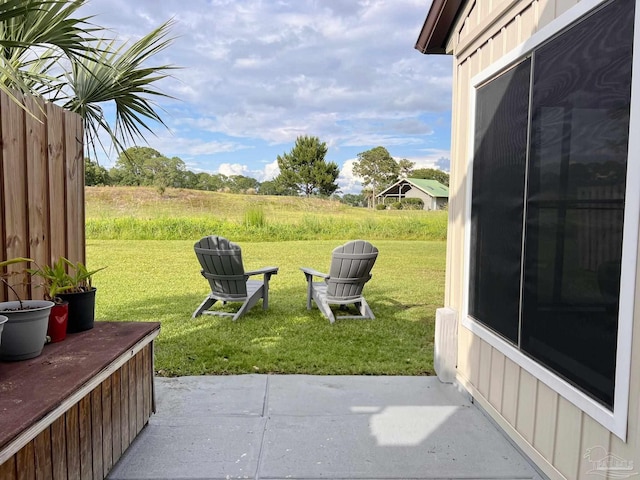 4718 Huron Dr, Pensacola, FL 32507 - view of green lawn featuring a patio