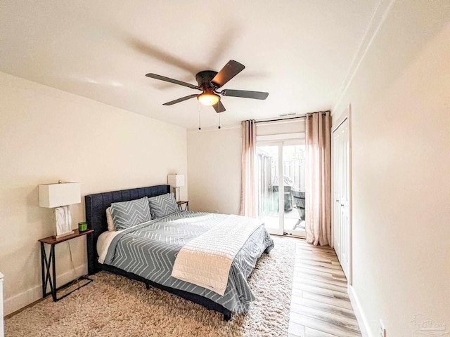 4718 Huron Dr, Pensacola, FL 32507 - bedroom with light wood-type flooring, access to outside, ceiling fan, and baseboards