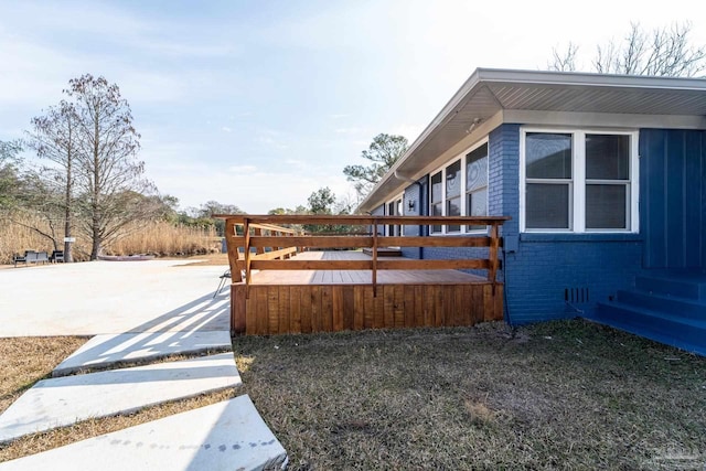 view of yard with a wooden deck