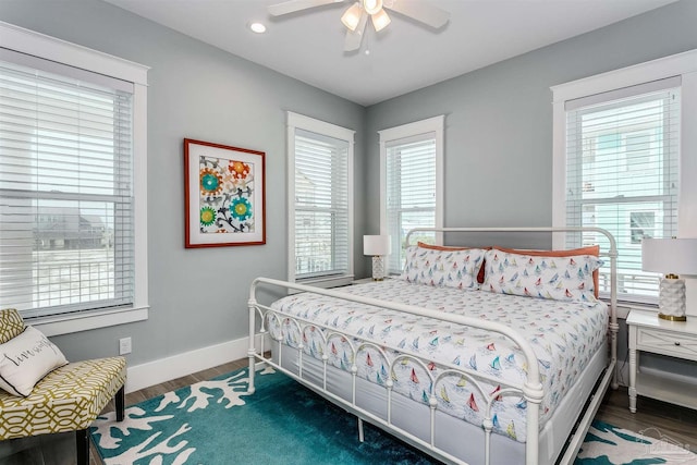 bedroom with ceiling fan, baseboards, wood finished floors, and recessed lighting