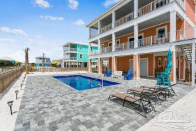 pool with a patio