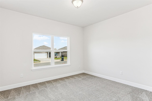 1644 Slate Dr, Cantonment, FL 32533 - unfurnished room featuring carpet floors and baseboards