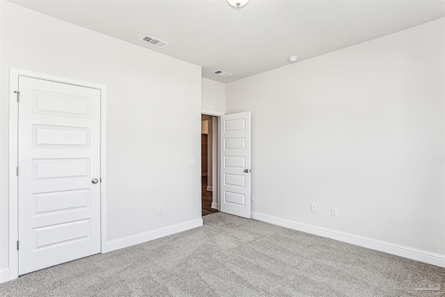 1644 Slate Dr, Cantonment, FL 32533 - unfurnished bedroom featuring carpet floors and baseboards