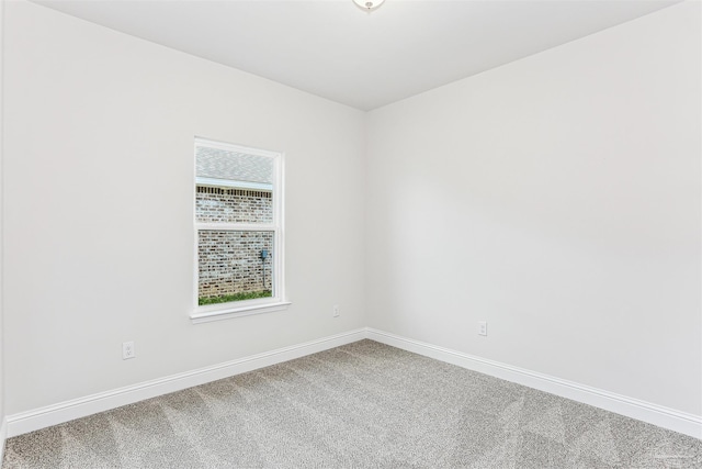 1644 Slate Dr, Cantonment, FL 32533 - spare room with carpet flooring, baseboards, and plenty of natural light