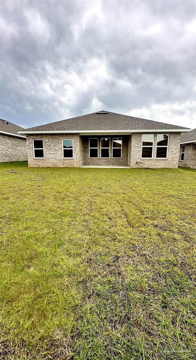 1644 Slate Dr, Cantonment, FL 32533 - view of front of house featuring a front lawn
