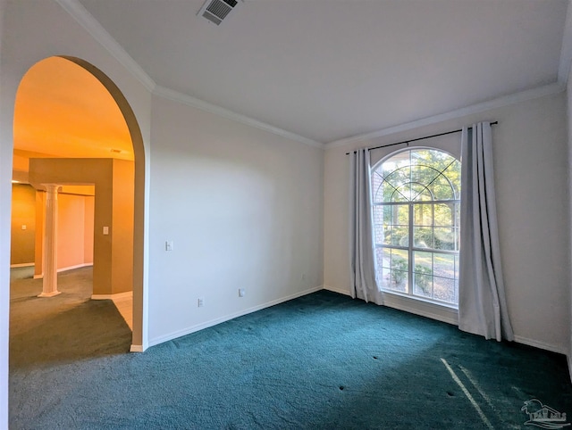 carpeted spare room with ornamental molding