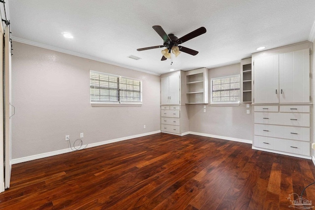 unfurnished bedroom with multiple windows, dark hardwood / wood-style floors, ceiling fan, and ornamental molding