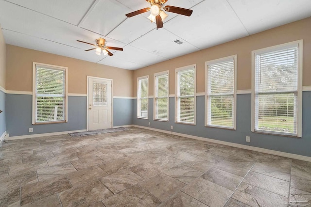 empty room featuring ceiling fan