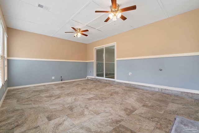 unfurnished room featuring ceiling fan