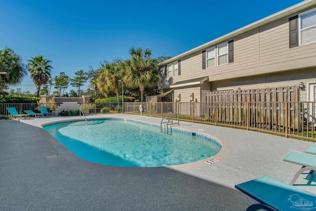 view of pool featuring a patio area