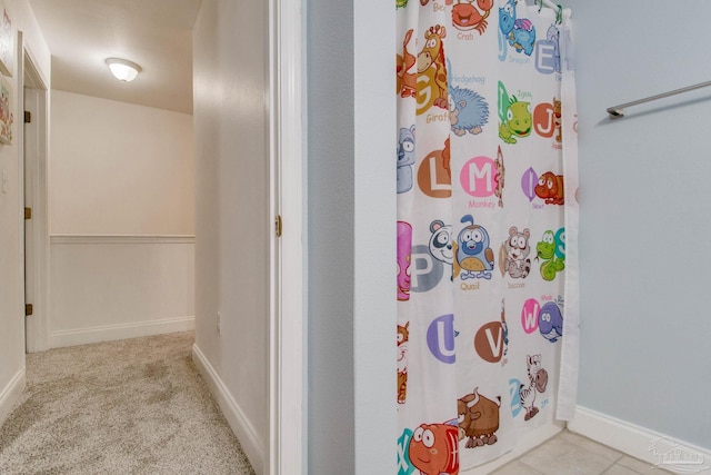 bathroom featuring curtained shower