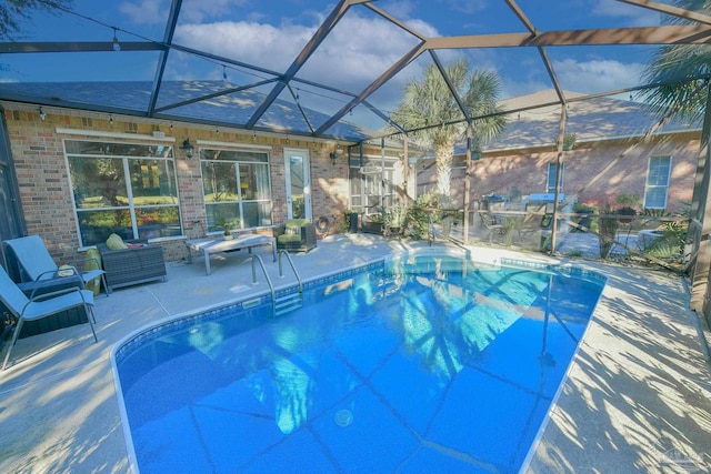 outdoor pool featuring a lanai, an outdoor living space, and a patio