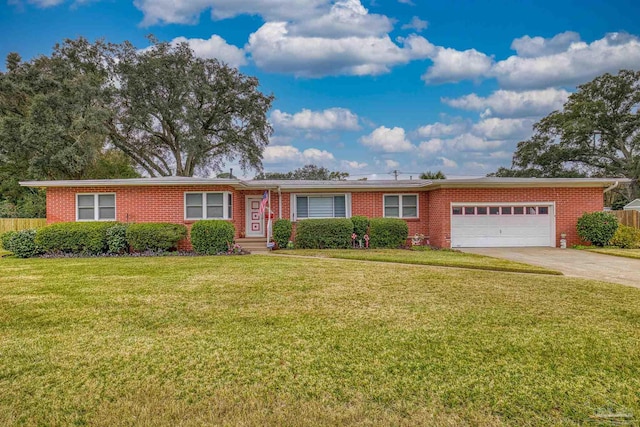 ranch-style home with a garage and a front yard