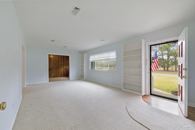 interior space with light colored carpet