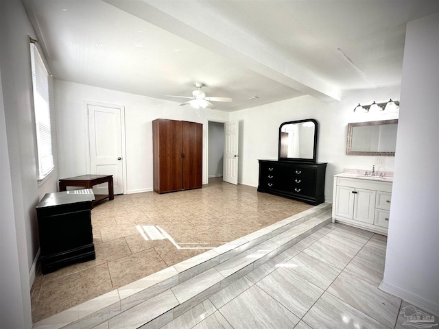 bathroom with ceiling fan and vanity