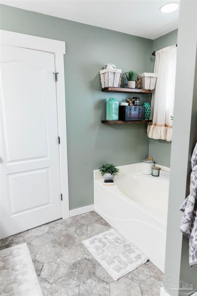 bathroom featuring a tub