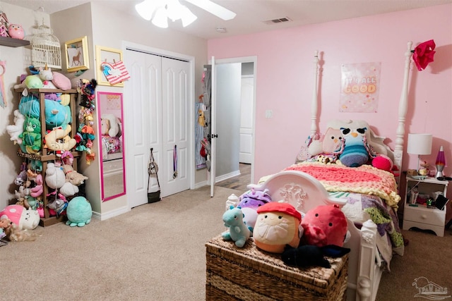 bedroom featuring ceiling fan, carpet flooring, and a closet